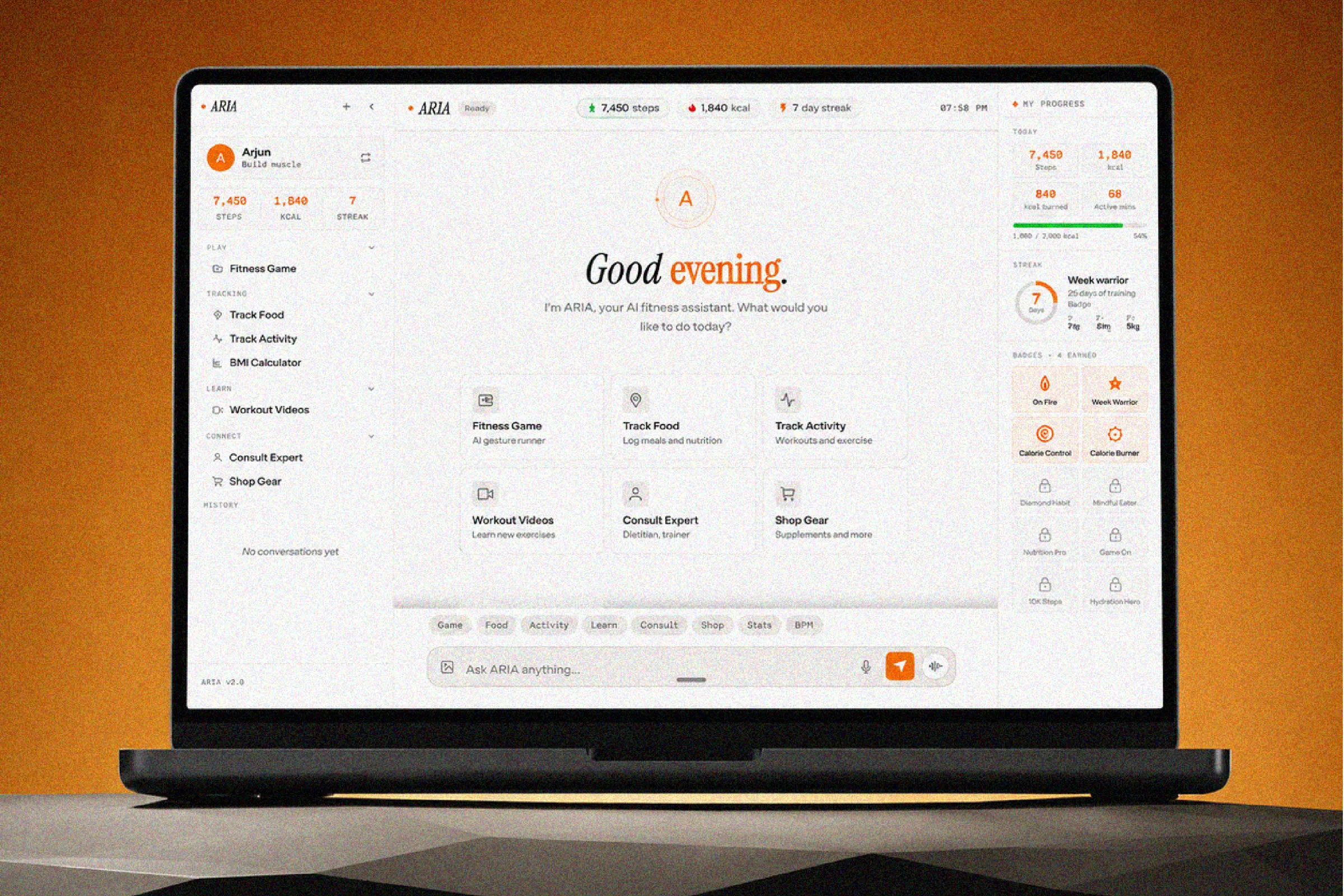 The ARIA dashboard open on a laptop against a warm orange backdrop